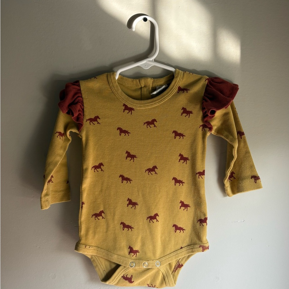 Kate Quinn Mustard Onesie with Red Horse Print